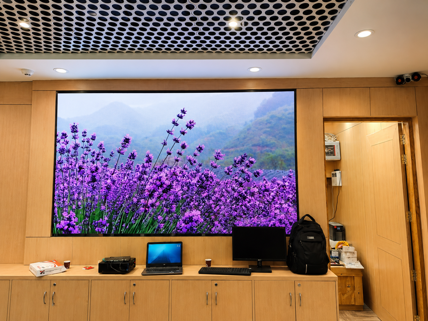 Kayeef indoor portrait LED display installed at UCO Bank branch showcasing brand ambassador content